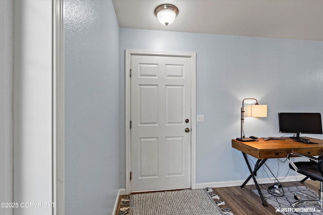 1786 E Neil Cir # 4, Wasilla, AK 99654 - entryway featuring baseboards and dark wood-style flooring