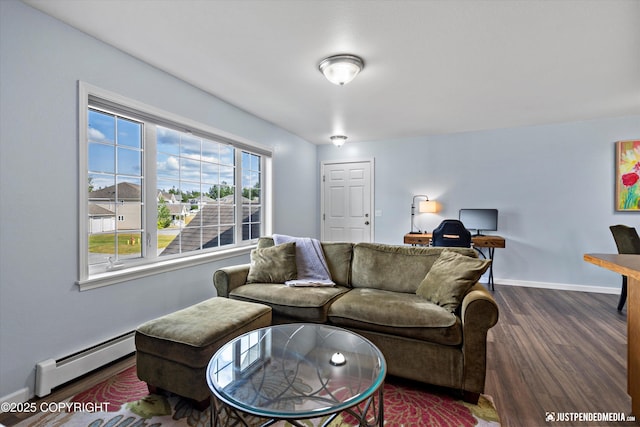 1786 E Neil Cir # 4, Wasilla, AK 99654 - living area featuring dark wood-type flooring, a baseboard heating unit, and an office area