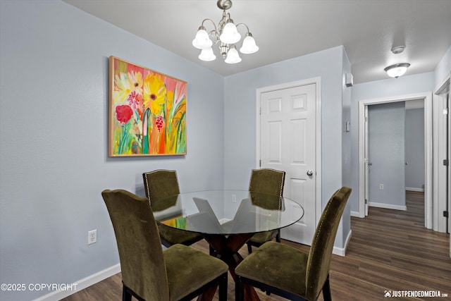 1786 E Neil Cir # 4, Wasilla, AK 99654 - dining space featuring a chandelier and wood finished floors
