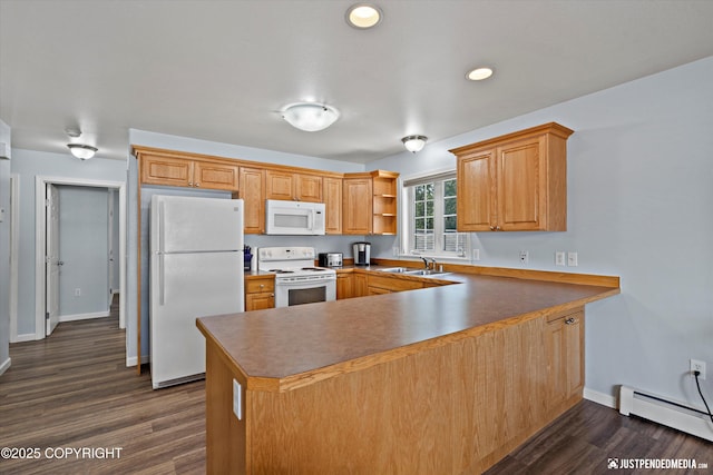 1786 E Neil Cir # 4, Wasilla, AK 99654 - kitchen with white appliances, a baseboard heating unit, a peninsula, dark wood finished floors, and open shelves