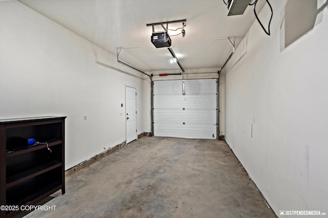 1786 E Neil Cir # 4, Wasilla, AK 99654 - garage featuring a garage door opener