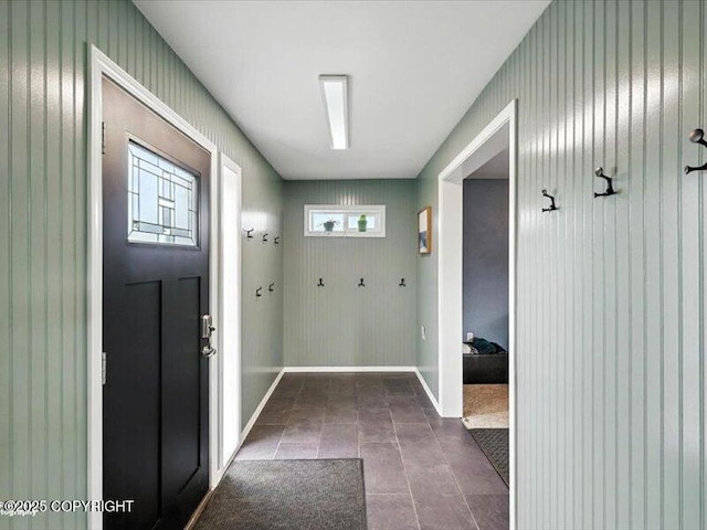 72155 Shannon Rd, Anchor Point, AK 99556 - mudroom with dark tile patterned floors and baseboards