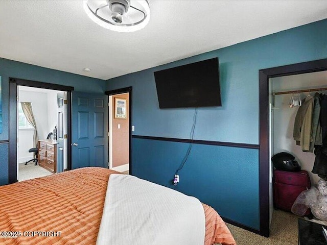 72155 Shannon Rd, Anchor Point, AK 99556 - carpeted bedroom featuring a closet and baseboards