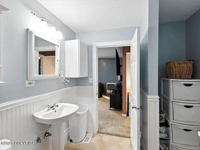 72155 Shannon Rd, Anchor Point, AK 99556 - half bath with toilet and a wainscoted wall