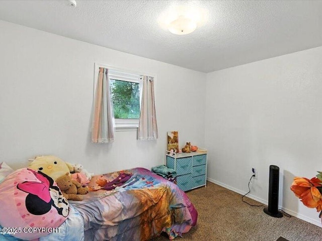 72155 Shannon Rd, Anchor Point, AK 99556 - carpeted bedroom with a textured ceiling