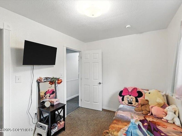 72155 Shannon Rd, Anchor Point, AK 99556 - carpeted bedroom with a textured ceiling