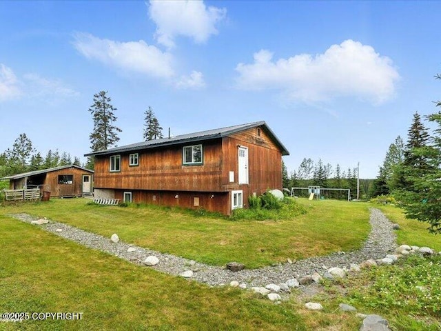 72155 Shannon Rd, Anchor Point, AK 99556 - view of property exterior featuring a lawn