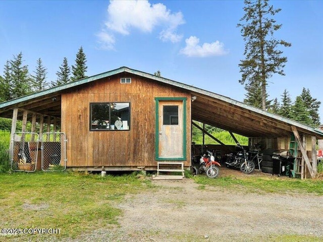 72155 Shannon Rd, Anchor Point, AK 99556 - view of outbuilding with a carport