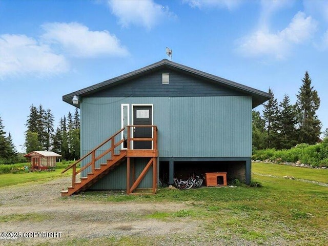 72155 Shannon Rd, Anchor Point, AK 99556 - back of property featuring stairs and a yard