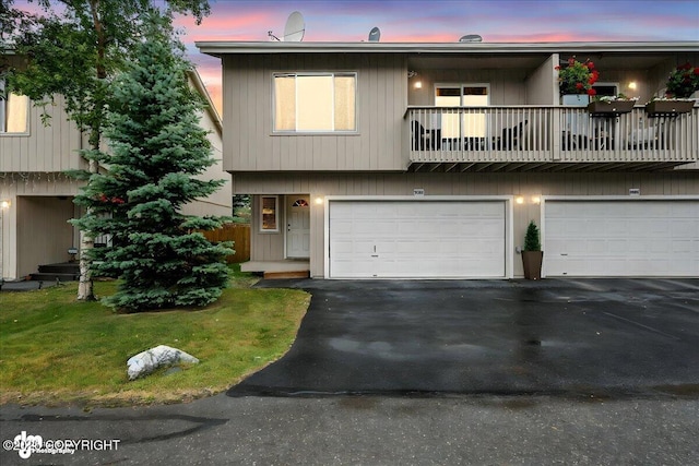 2608 Lauren Creek Loop # 4, Anchorage, AK 99507 - multi unit property featuring a garage, a balcony, and driveway