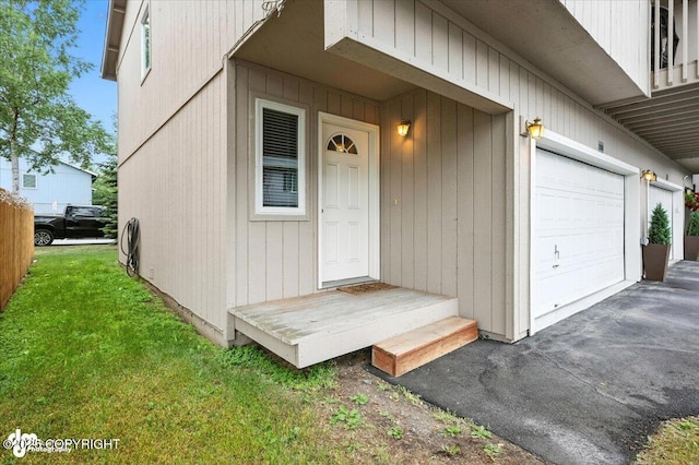 2608 Lauren Creek Loop # 4, Anchorage, AK 99507 - entrance to property with a garage and a yard