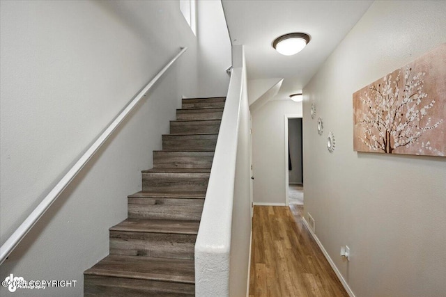 2608 Lauren Creek Loop # 4, Anchorage, AK 99507 - stairs with wood finished floors and baseboards