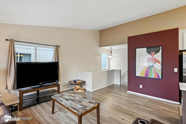 2608 Lauren Creek Loop # 4, Anchorage, AK 99507 - living room featuring wood finished floors