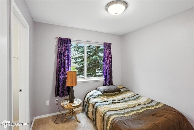 2608 Lauren Creek Loop # 4, Anchorage, AK 99507 - carpeted bedroom featuring baseboards