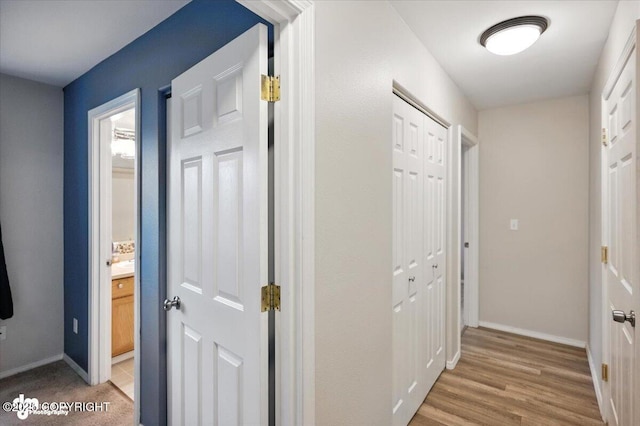 2608 Lauren Creek Loop # 4, Anchorage, AK 99507 - corridor featuring baseboards and light wood finished floors