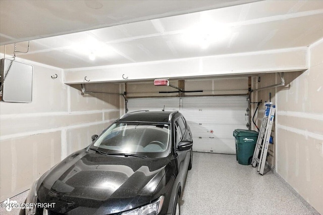 2608 Lauren Creek Loop # 4, Anchorage, AK 99507 - garage with a garage door opener