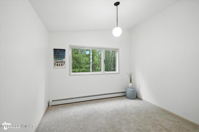 3291 N Edgewater Dr, Wasilla, AK 99623 - carpeted empty room featuring a baseboard heating unit