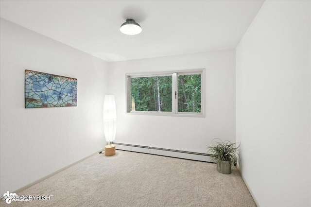 3291 N Edgewater Dr, Wasilla, AK 99623 - spare room featuring carpet and a baseboard radiator