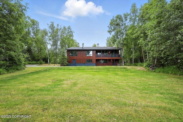3291 N Edgewater Dr, Wasilla, AK 99623 - rear view of house with a yard and a wooden deck