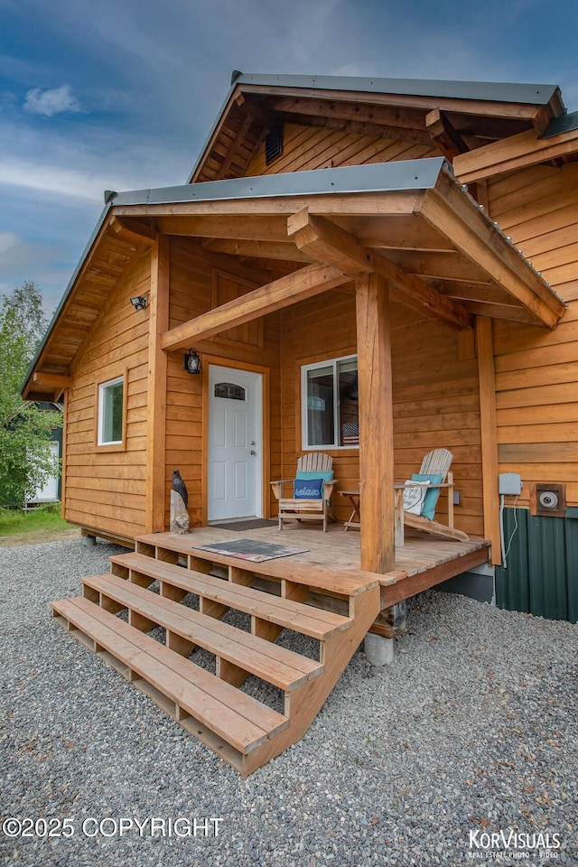 14327 E Birch Cir, Talkeetna, AK 99676 - view of exterior entry with a deck