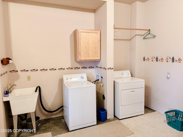 28180 Coastal Vista Cir, Anchor Point, AK 99556 - laundry room featuring cabinet space and washer and dryer