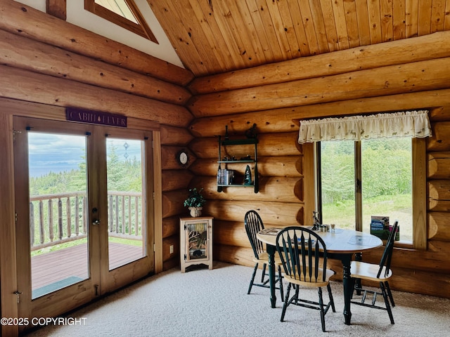 28180 Coastal Vista Cir, Anchor Point, AK 99556 - dining room featuring carpet, french doors, plenty of natural light, wooden ceiling, and log walls