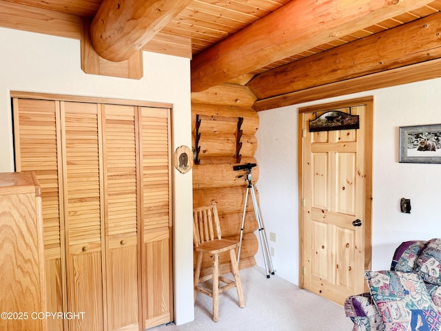 28180 Coastal Vista Cir, Anchor Point, AK 99556 - office featuring a wood ceiling with exposed beams, light colored carpet, and rustic walls