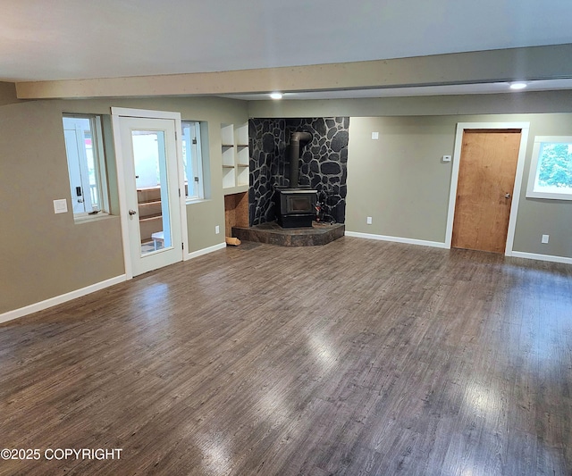 3043 Lakeview Dr, Kodiak, AK 99615 - unfurnished living room featuring wood finished floors and a wood stove