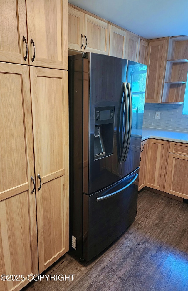 3043 Lakeview Dr, Kodiak, AK 99615 - kitchen with black fridge, light brown cabinetry, dark wood-style floors, open shelves, and light countertops
