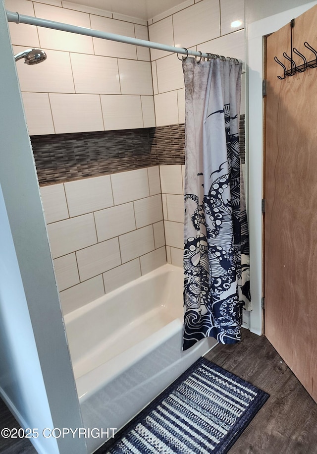 3043 Lakeview Dr, Kodiak, AK 99615 - bathroom featuring wood finished floors and shower / bathtub combination with curtain