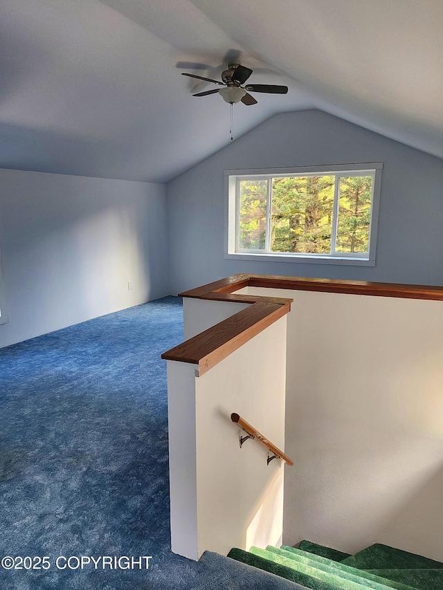 3043 Lakeview Dr, Kodiak, AK 99615 - stairs with a ceiling fan, carpet, and lofted ceiling