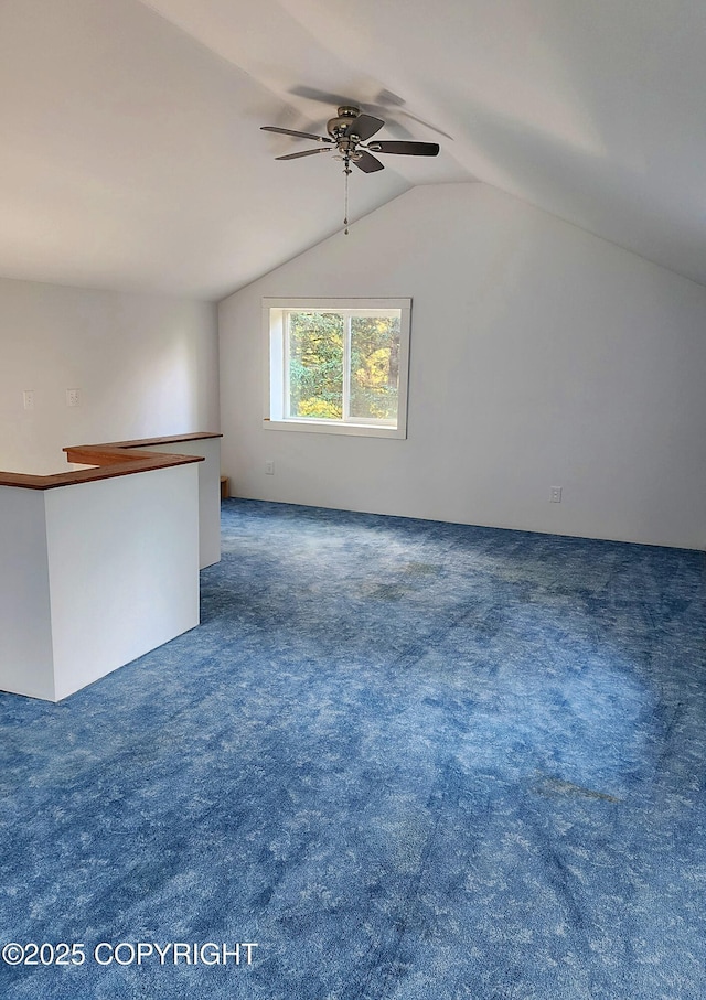 3043 Lakeview Dr, Kodiak, AK 99615 - carpeted empty room with ceiling fan and vaulted ceiling