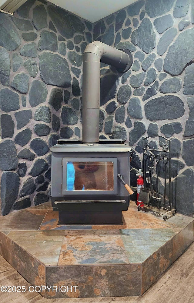 3043 Lakeview Dr, Kodiak, AK 99615 - detailed view of a wood stove and wood finished floors