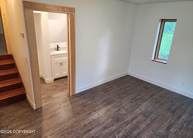 3043 Lakeview Dr, Kodiak, AK 99615 - empty room with dark wood-style flooring and stairs
