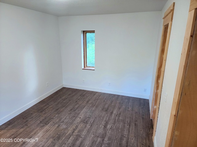 3043 Lakeview Dr, Kodiak, AK 99615 - unfurnished room with dark wood finished floors and baseboards