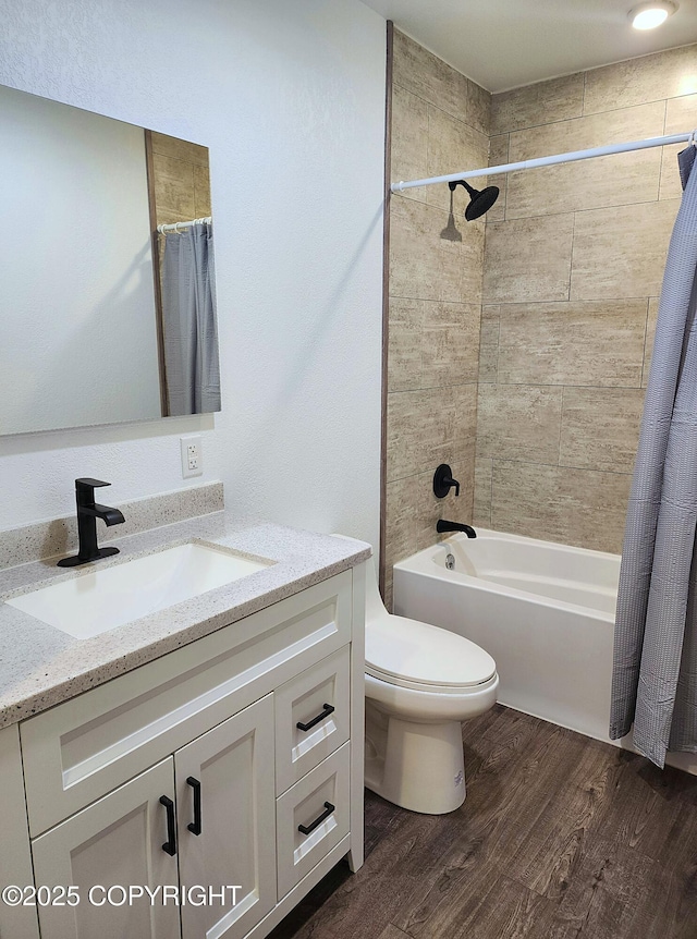 3043 Lakeview Dr, Kodiak, AK 99615 - full bathroom featuring vanity, wood finished floors, and shower / bath combo with shower curtain