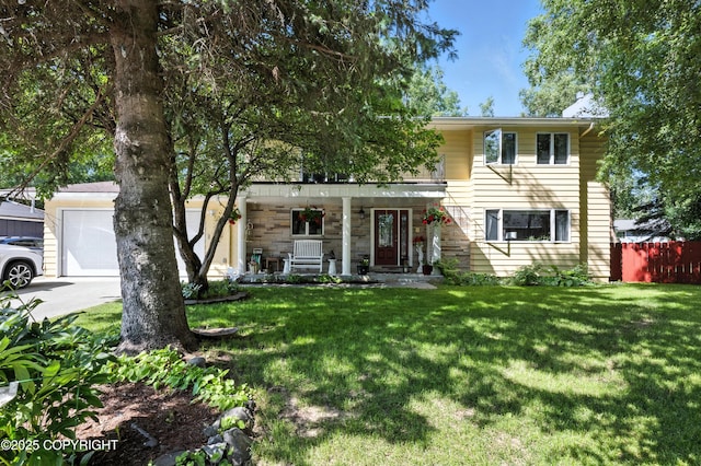 3002 Glacier St, Anchorage, AK 99508 - view of front of home with a porch, a garage, stone siding, and concrete driveway
