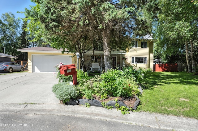 3002 Glacier St, Anchorage, AK 99508 - obstructed view of property featuring a garage and concrete driveway