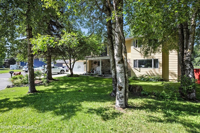 3002 Glacier St, Anchorage, AK 99508 - view of front facade featuring a front yard