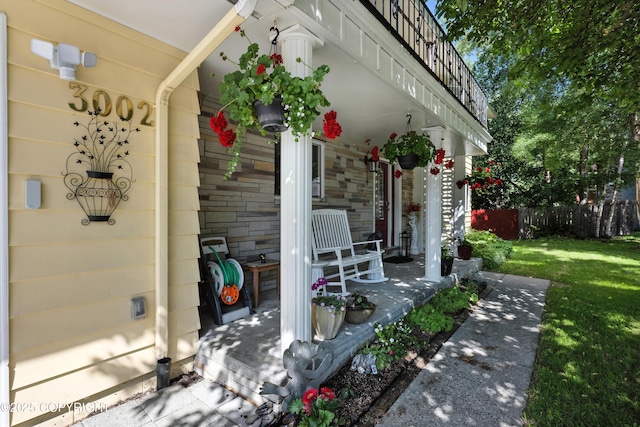 3002 Glacier St, Anchorage, AK 99508 - doorway to property featuring covered porch