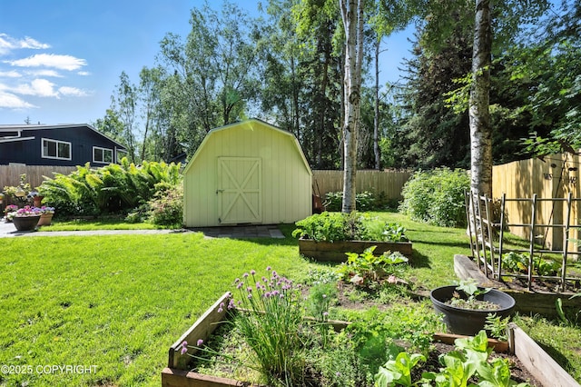 3002 Glacier St, Anchorage, AK 99508 - fenced backyard featuring a garden and a storage unit