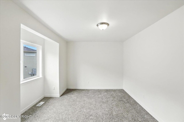 165 Rusty Allen Pl # 64, Anchorage, AK 99504 - carpeted spare room with baseboards