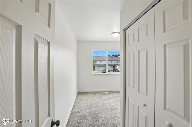 165 Rusty Allen Pl # 64, Anchorage, AK 99504 - corridor with carpet flooring and baseboards