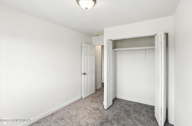 165 Rusty Allen Pl # 64, Anchorage, AK 99504 - unfurnished bedroom with carpet and a closet