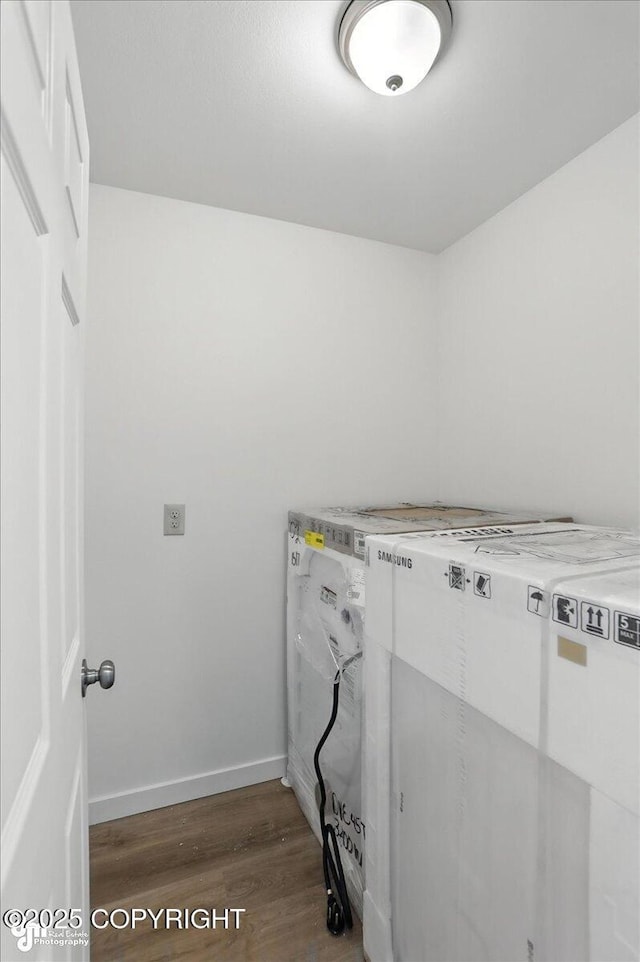 165 Rusty Allen Pl # 64, Anchorage, AK 99504 - washroom featuring wood finished floors and baseboards