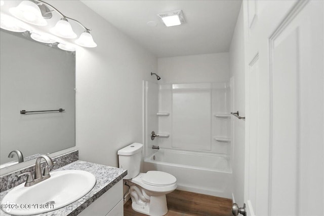 165 Rusty Allen Pl # 64, Anchorage, AK 99504 - full bathroom with vanity, wood finished floors, and bathing tub / shower combination