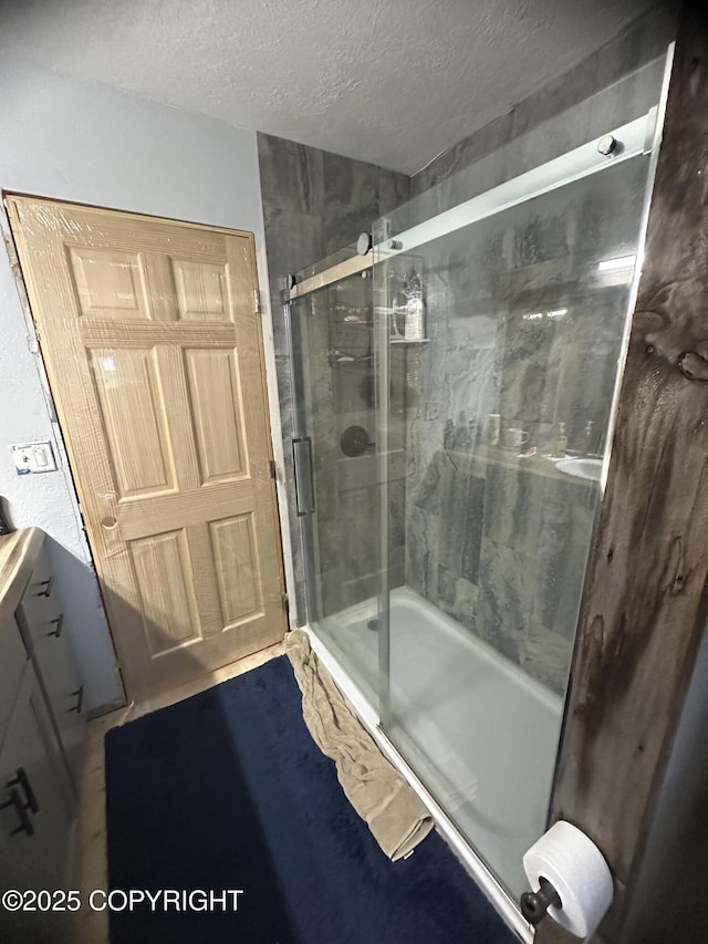 52193 Marlene Ave, Nikiski/North Kenai, AK 99611 - bathroom featuring a textured ceiling and vanity