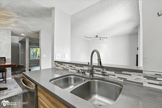 3298 Montpelier Ct Unit 12F, Anchorage, AK 99503 - kitchen featuring a textured ceiling, dark stone counters, dishwasher, brown cabinetry, and decorative backsplash