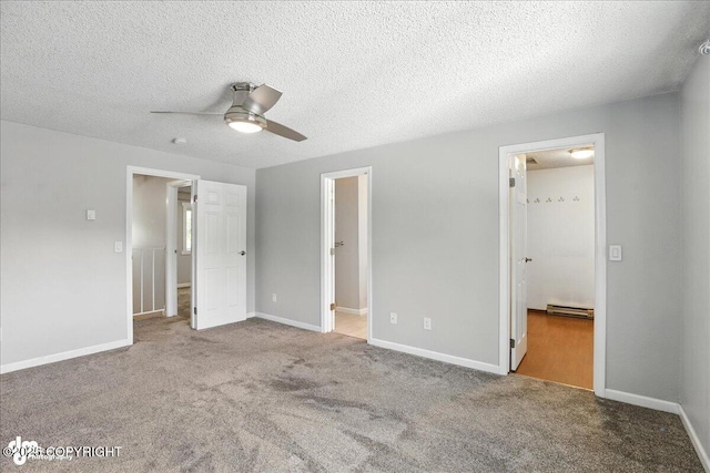 3298 Montpelier Ct Unit 12F, Anchorage, AK 99503 - unfurnished bedroom featuring a baseboard heating unit, carpet flooring, connected bathroom, a textured ceiling, and ceiling fan