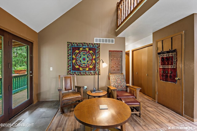 7409 S Timberview Dr, Wasilla, AK 99623 - sitting room with high vaulted ceiling and light wood-style flooring